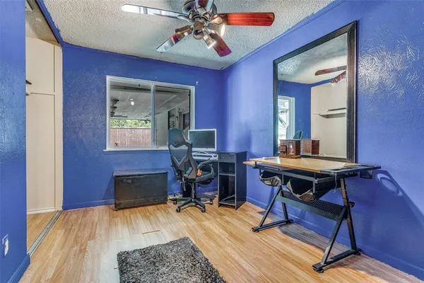 a view of a workspace with furniture