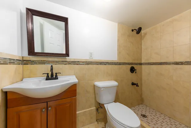 a reading room with furniture and a window