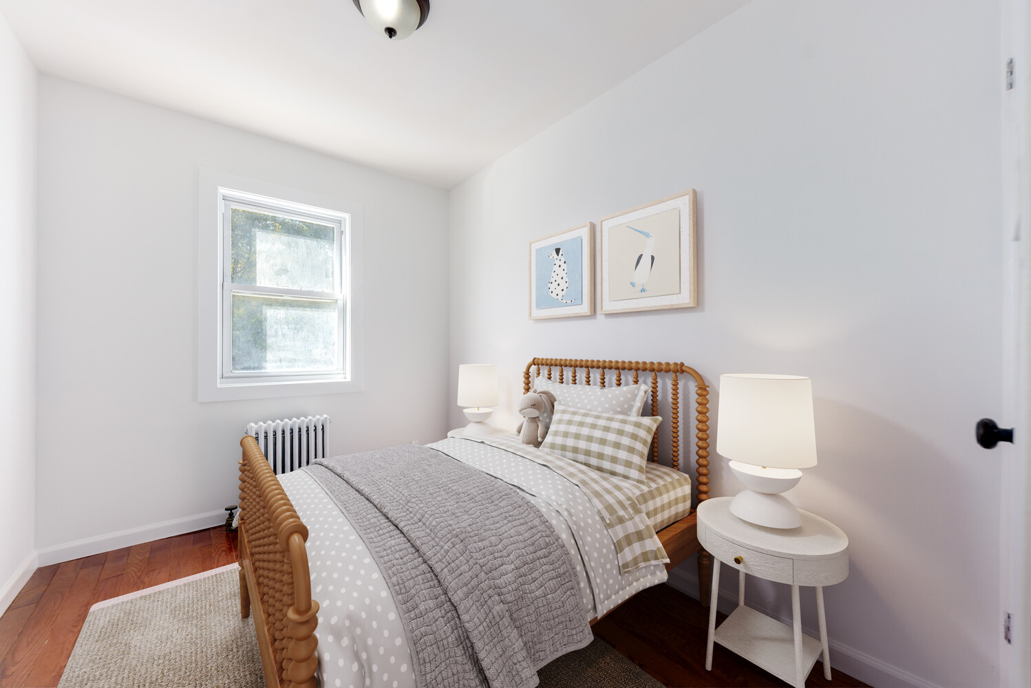 102 183rd Place Queens, NY 11423 - Photo 7 of 13 a bedroom with a bed and a table with chair