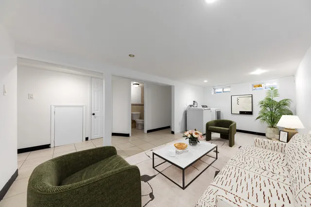 a bedroom with a bed and a table with chair