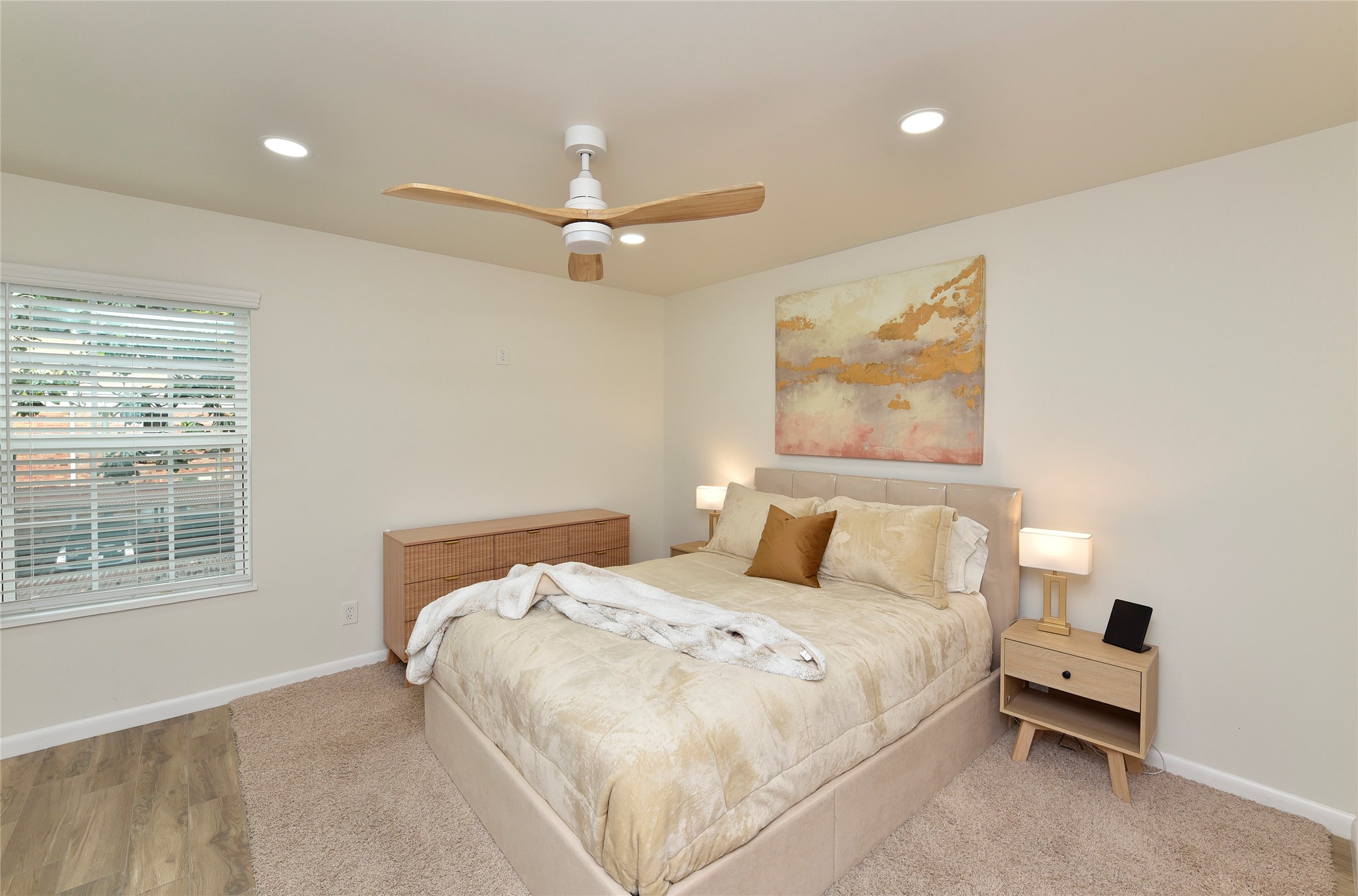 3224 Timmons Lane, Unit 112 Houston, TX 77027 - Photo 26 of 30 a bedroom with a large bed and a window