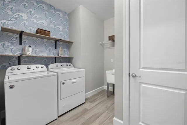 a utility room with dryer and washer