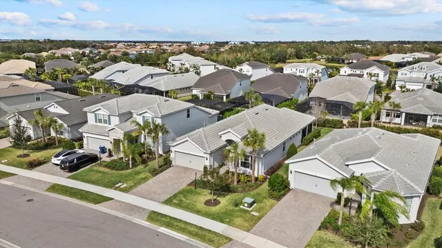 an aerial view of a house with a garden