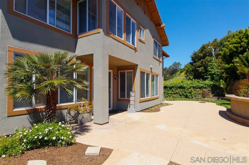 1935 Ivy Road Oceanside, CA 92054 - Photo 3 of 25 a view of a house with a yard
