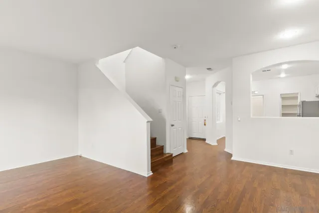 a view of entryway with wooden floor