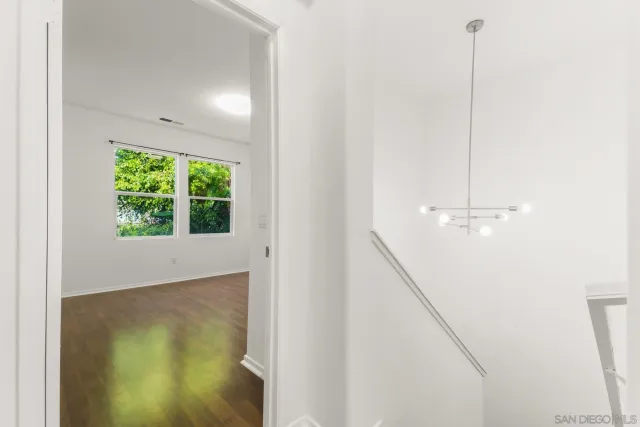 a view of a room with a window