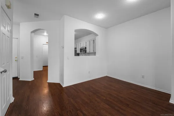 wooden floor in a hall with an entryway