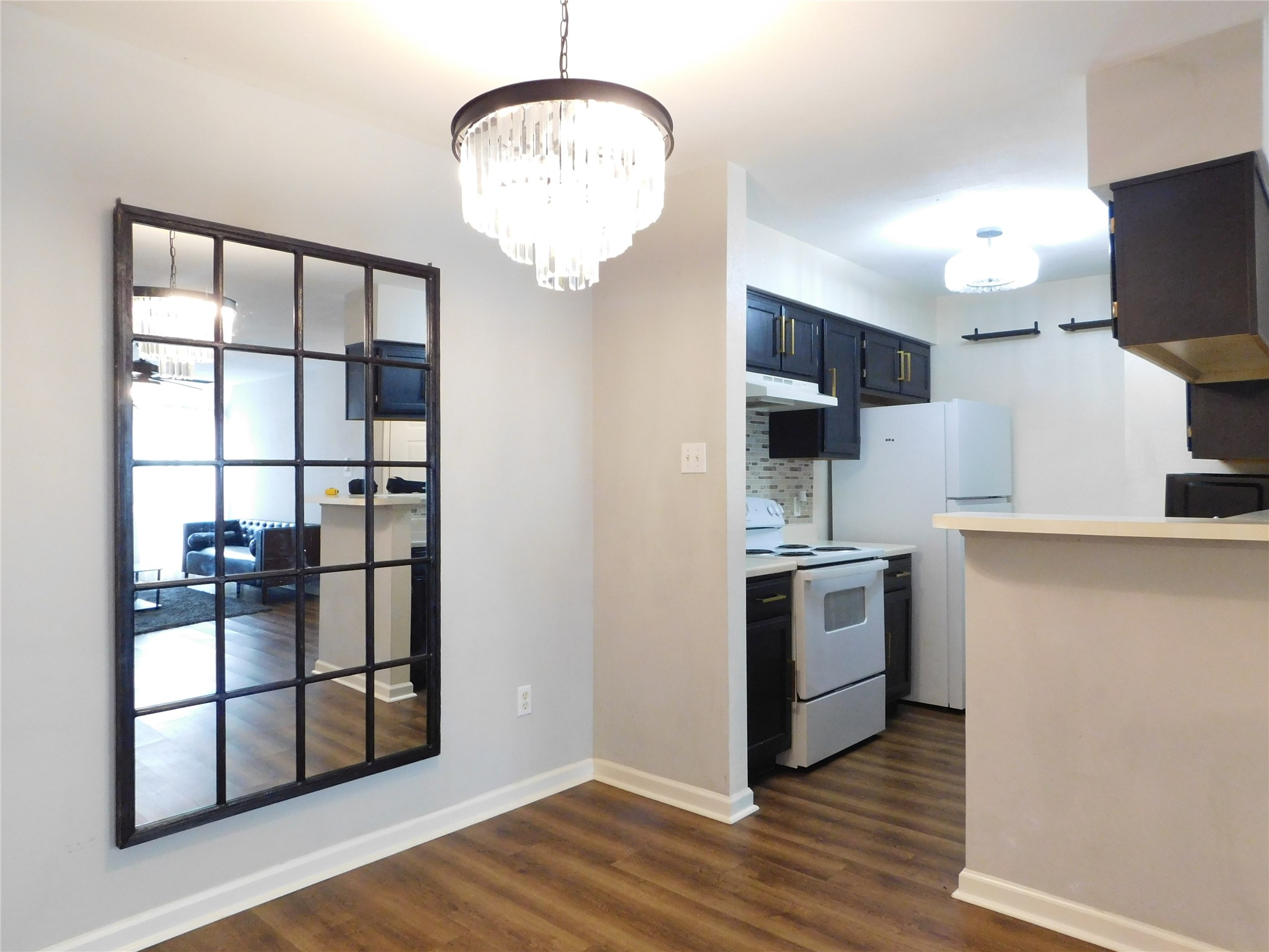 10101 South Gessner Road, Unit 912 Houston, TX 77071 - Photo 10 of 47 a kitchen with stainless steel appliances a refrigerator and a stove top oven