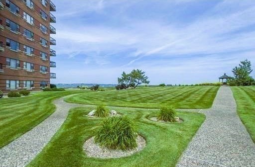 3 Seal Harbor Road, Unit 632 Winthrop, MA 02152 - Photo 20 of 34 a view of a big building with a big yard