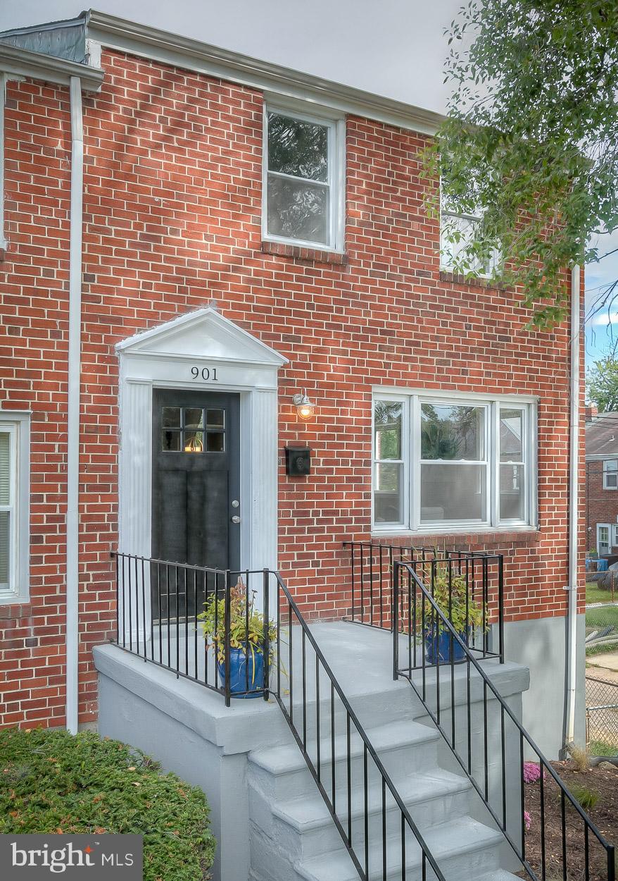901 Stamford Road Baltimore, MD 21229 - Photo 1 of 27 a front view of a house with a porch
