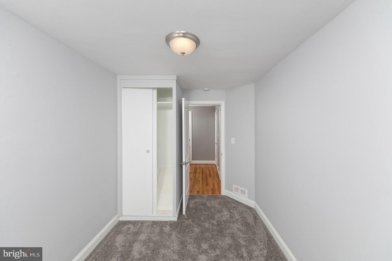 901 Stamford Road Baltimore, MD 21229 - Photo 18 of 27 a view of hallway with closet