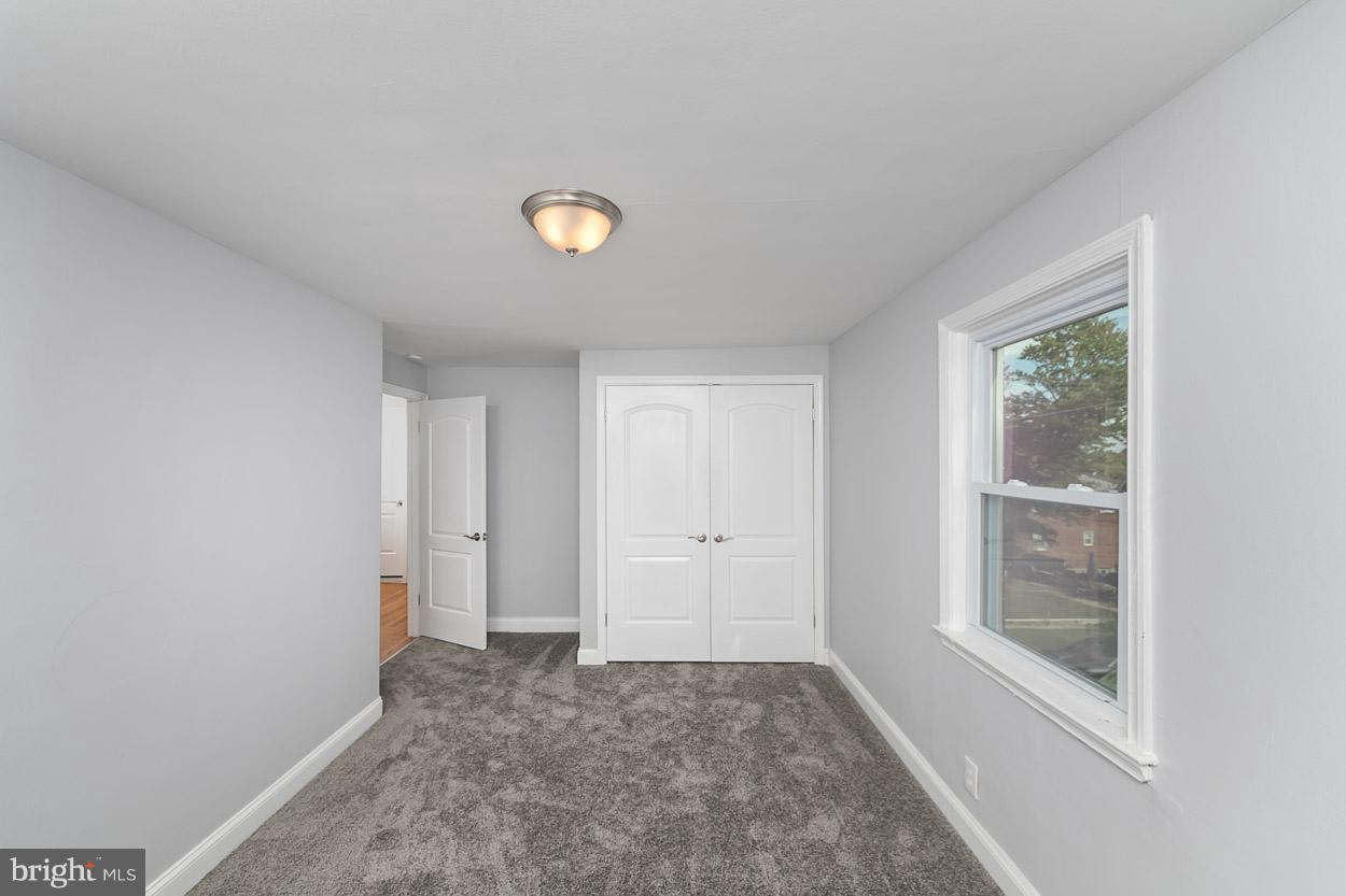 901 Stamford Road Baltimore, MD 21229 - Photo 20 of 27 a view of an empty room with a window