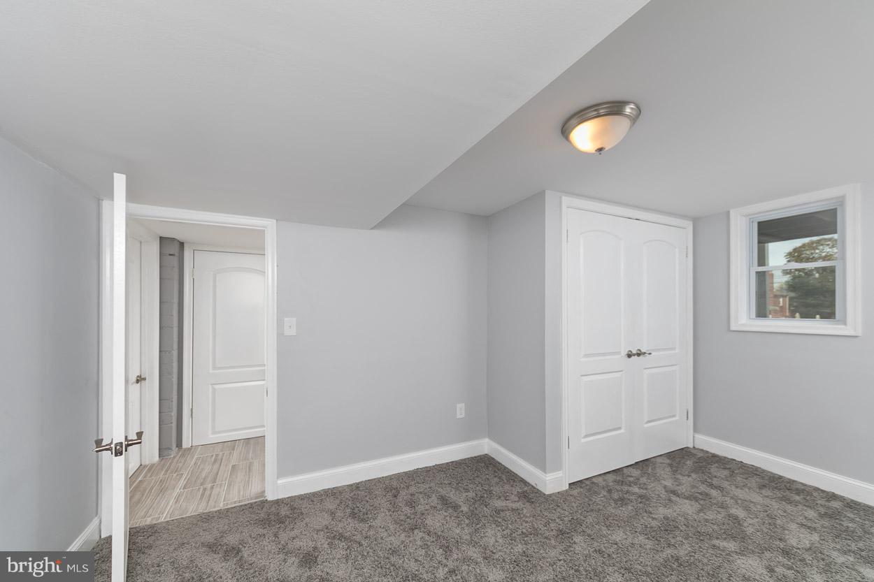 901 Stamford Road Baltimore, MD 21229 - Photo 26 of 27 an empty room with windows
