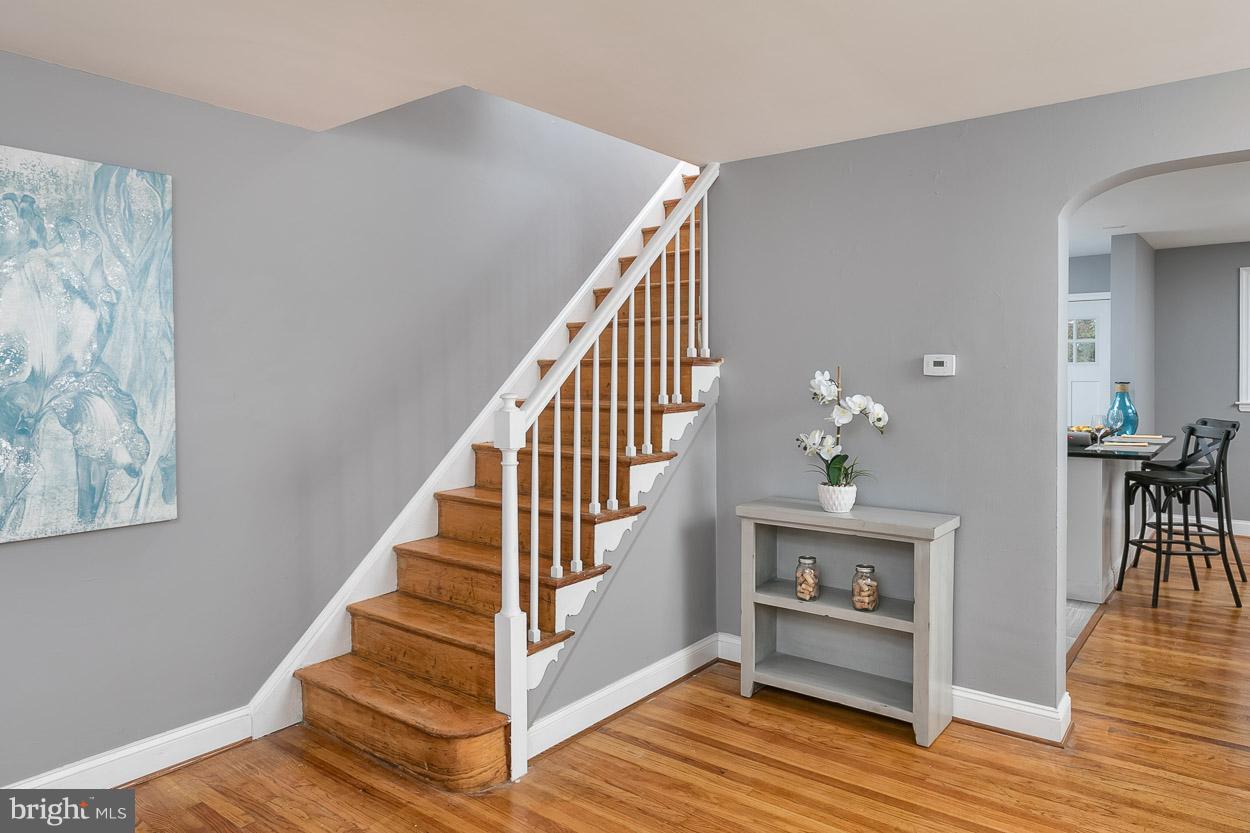901 Stamford Road Baltimore, MD 21229 - Photo 7 of 27 a view of entryway and hall with wooden floor