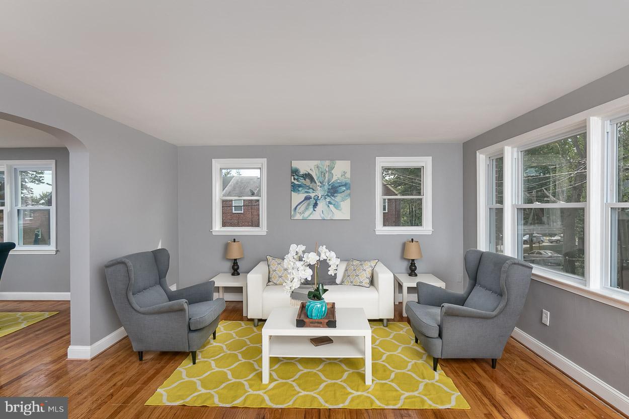 901 Stamford Road Baltimore, MD 21229 - Photo 8 of 27 a living room with furniture and a large window