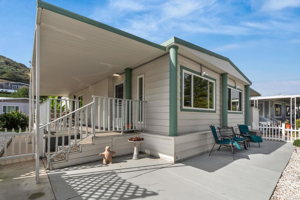 7467 Mission Gorge Road, Unit 104 Santee, CA 92071 - Photo 1 of 25 a view of house with outdoor seating