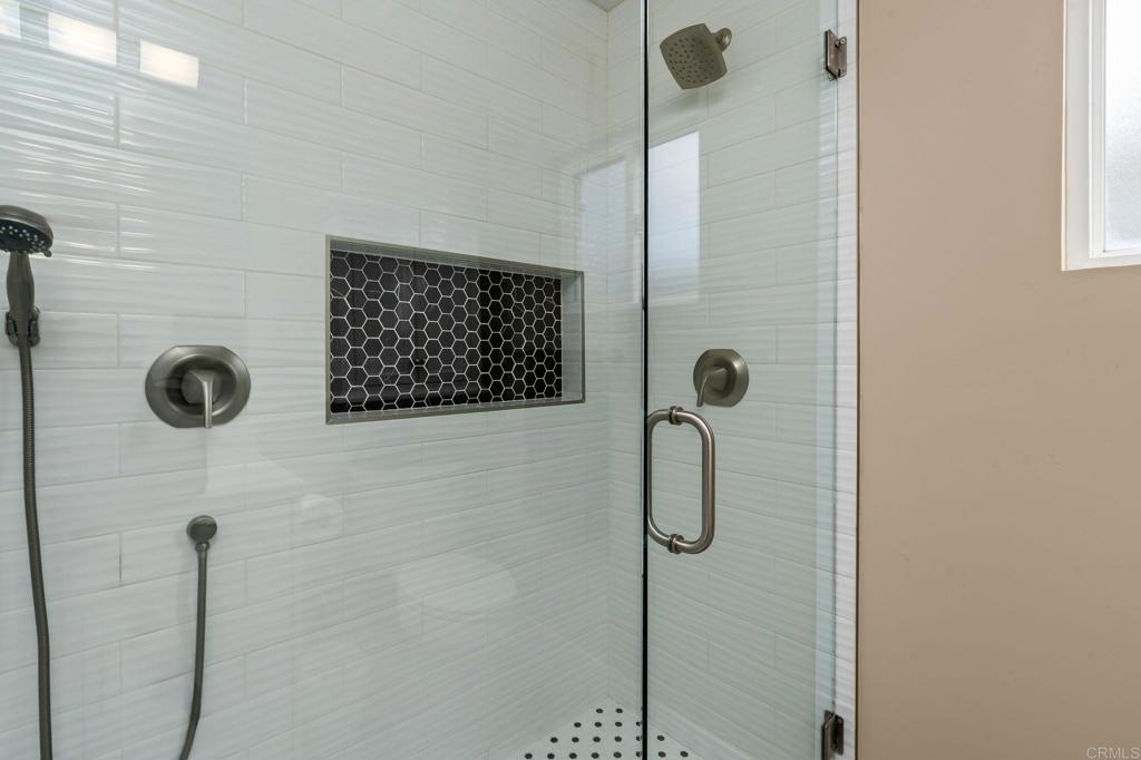 7467 Mission Gorge Road, Unit 104 Santee, CA 92071 - Photo 17 of 25 a bathroom with a shower