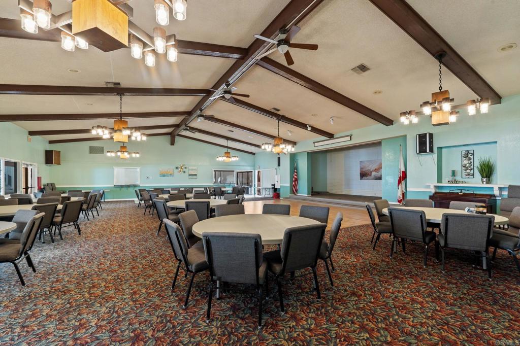 7467 Mission Gorge Road, Unit 104 Santee, CA 92071 - Photo 24 of 25 a view of a dining room with furniture