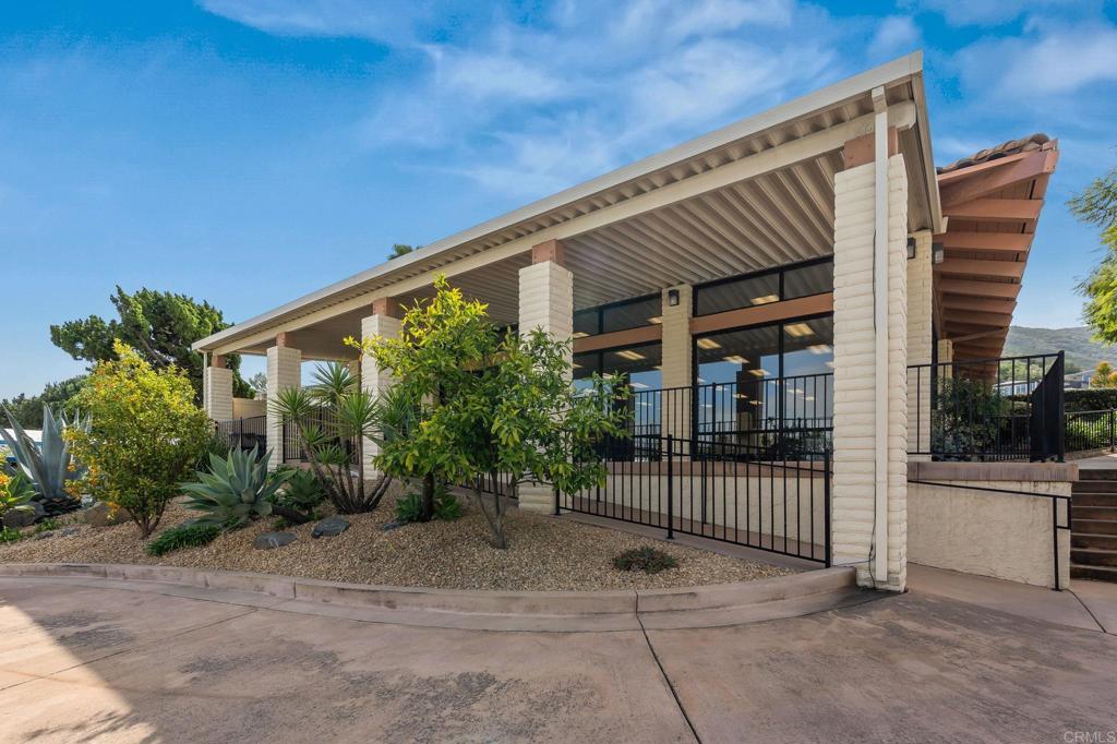 7467 Mission Gorge Road, Unit 104 Santee, CA 92071 - Photo 25 of 25 a porch with seating space