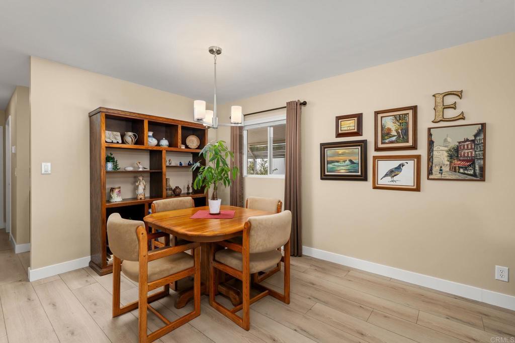 7467 Mission Gorge Road, Unit 104 Santee, CA 92071 - Photo 8 of 25 a dining room with furniture and window