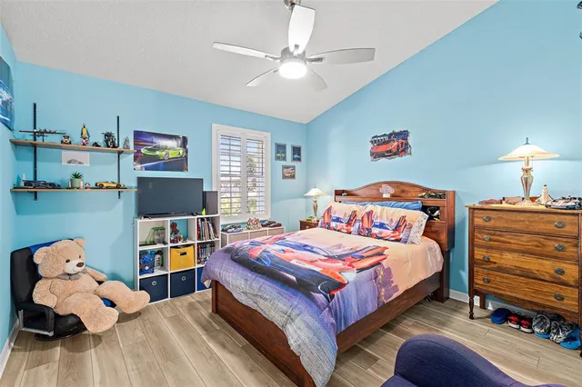 a kitchen with a sink and a refrigerator
