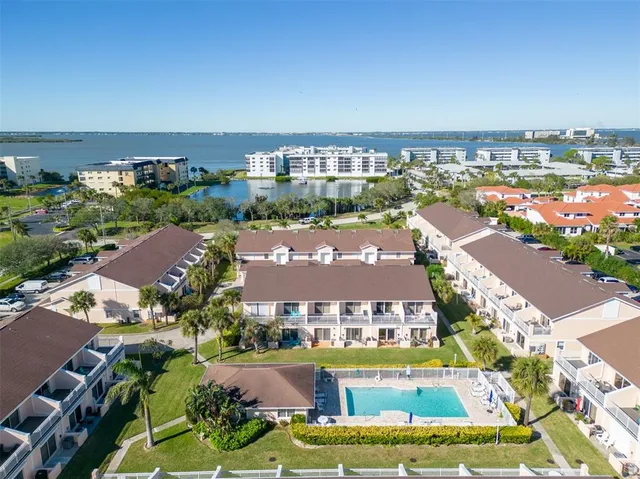 a view of a fountain in front of a house