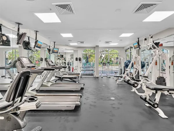 a view of a hallway with seating area