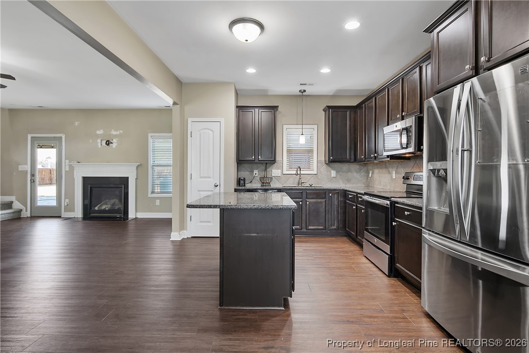 6728 Running Fox Road Hope Mills, NC 28348 - Photo 15 of 48 Kitchen open to Great Room