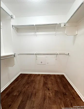 a view of a room with racks on the wall