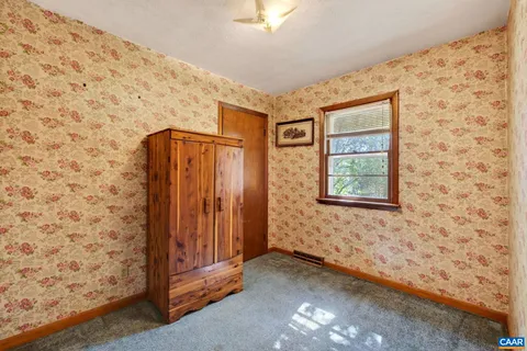 a view of a hallway with closet
