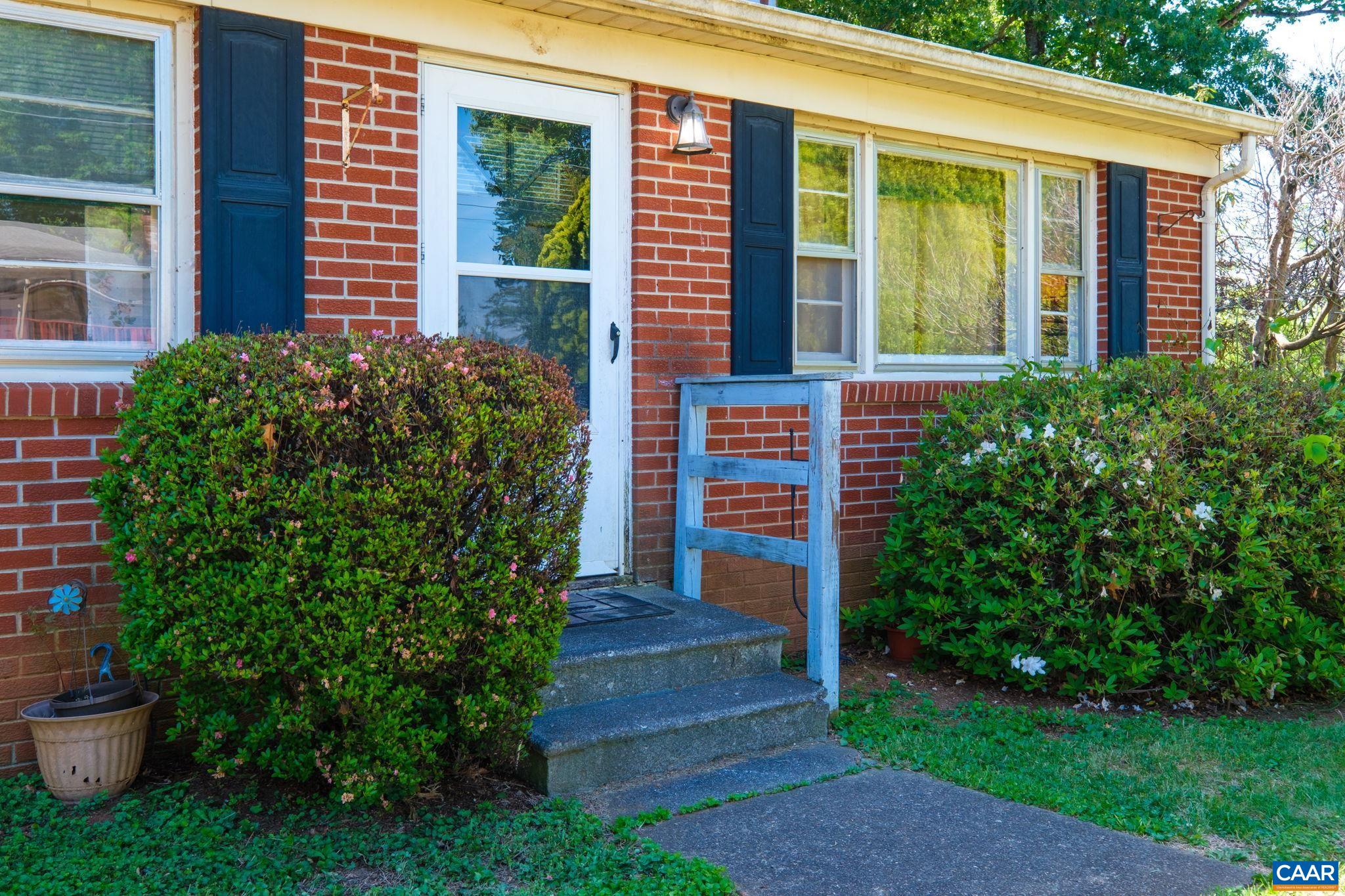 374 Locust Lane Ruckersville, VA 22968 - Photo 27 of 28 front view of a house with a yard