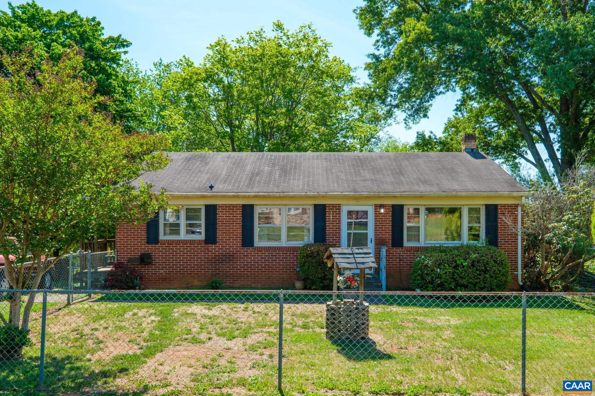 374 Locust Lane Ruckersville, VA 22968 - Photo 28 of 28 a front view of a house with a yard