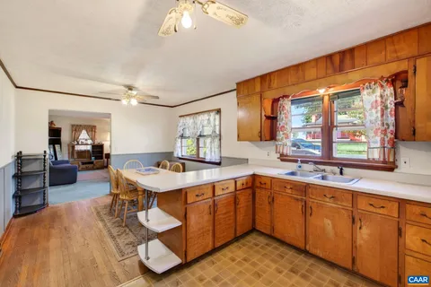 a room with sink and window