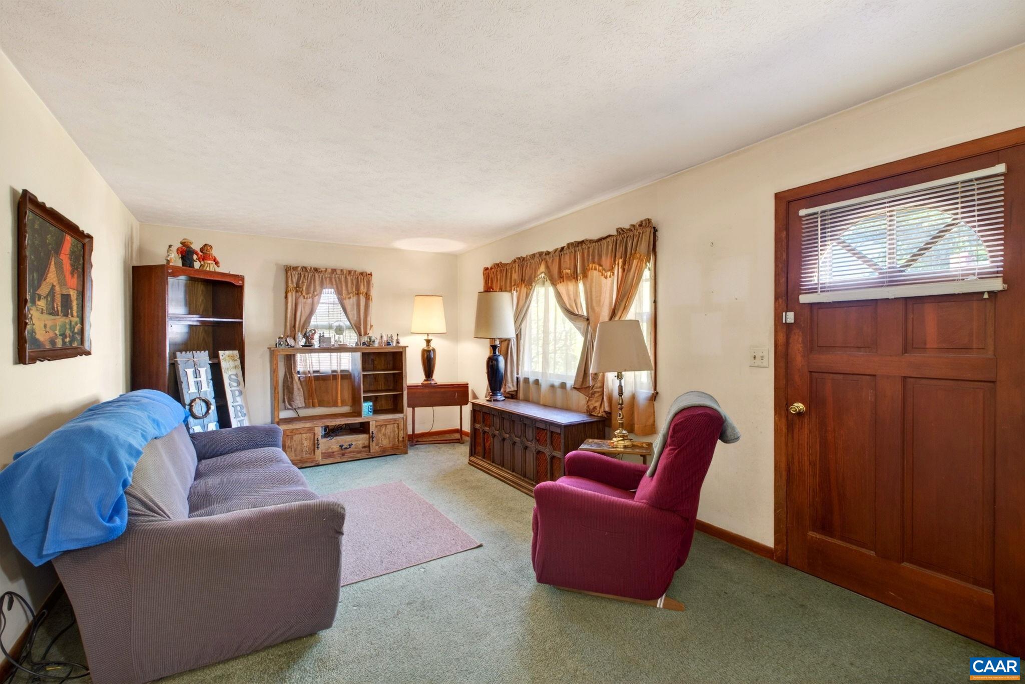 374 Locust Lane Ruckersville, VA 22968 - Photo 7 of 28 a living room with furniture and a window