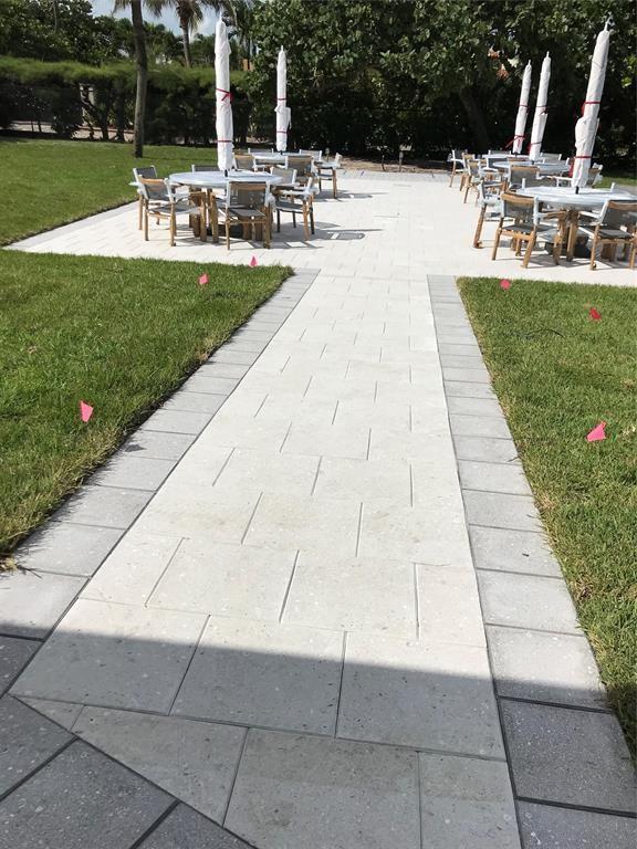 333 Northeast 21st Avenue, Unit 318 Deerfield Beach, FL 33441 - Photo 25 of 40 a view of outdoor space yard and patio
