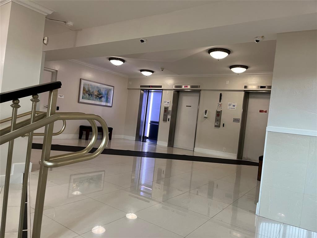 333 Northeast 21st Avenue, Unit 318 Deerfield Beach, FL 33441 - Photo 37 of 40 a view of a livingroom with washer and dryer