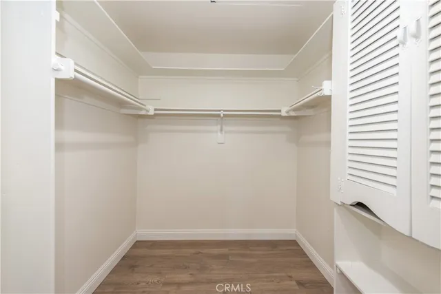 a view of an empty walk in closet