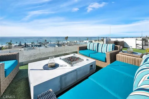 a view of a terrace with furniture