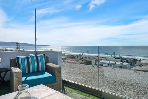 a view of roof deck with seating space