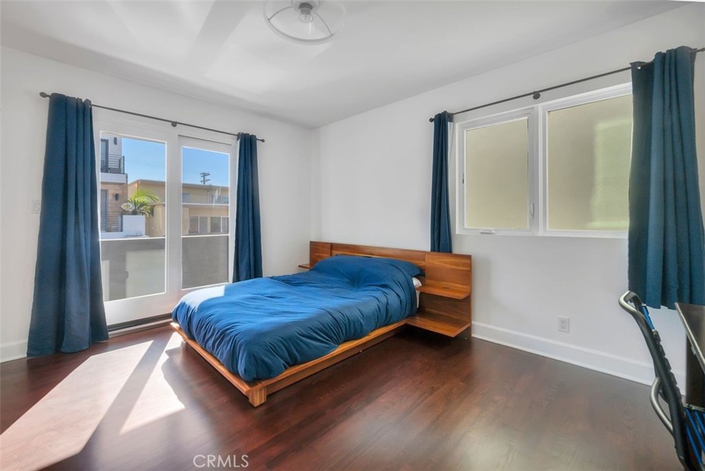 225 33rd Street Hermosa Beach, CA 90254 - Photo 23 of 37 a bedroom with a bed and a window