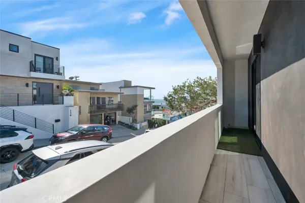 a view of balcony with furniture