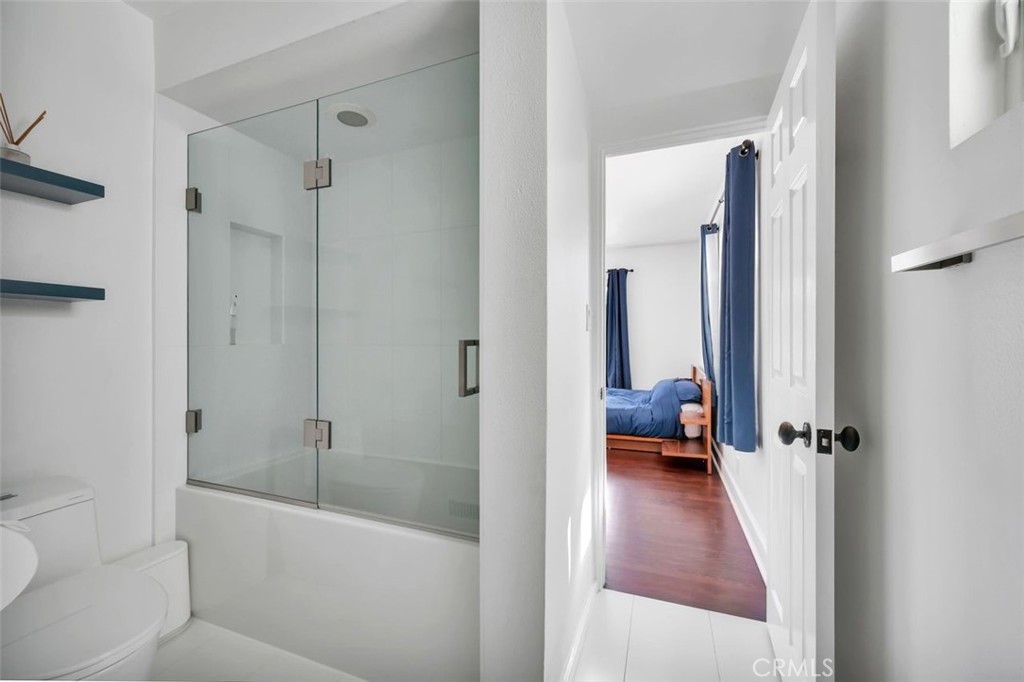 225 33rd Street Hermosa Beach, CA 90254 - Photo 26 of 37 a en suite bathroom with a tub shower and a sink
