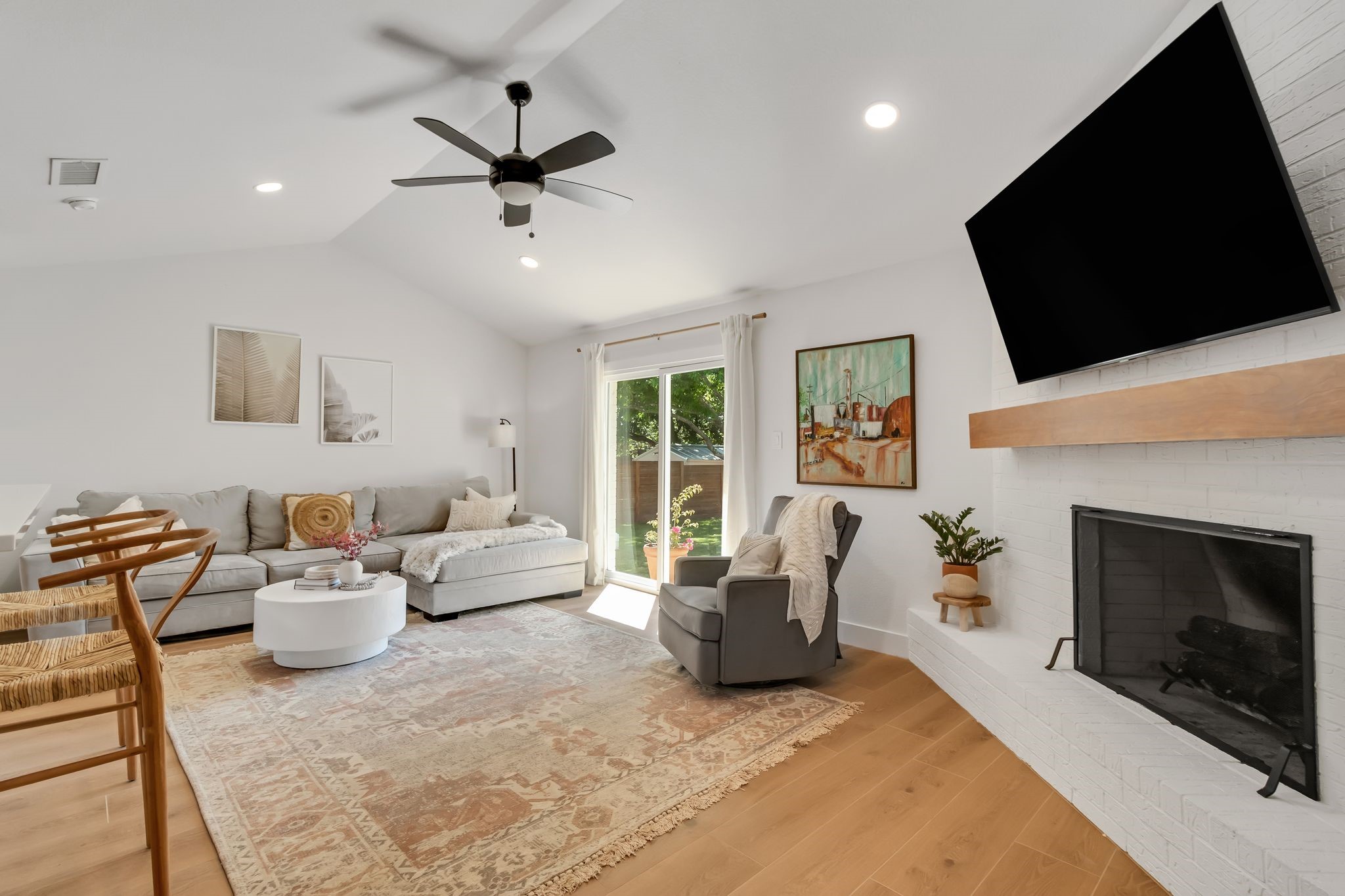 213 Clear Springs Road Georgetown, TX 78628 - Photo 15 of 33 Custom Wood Mantel and Vaulted Ceiling