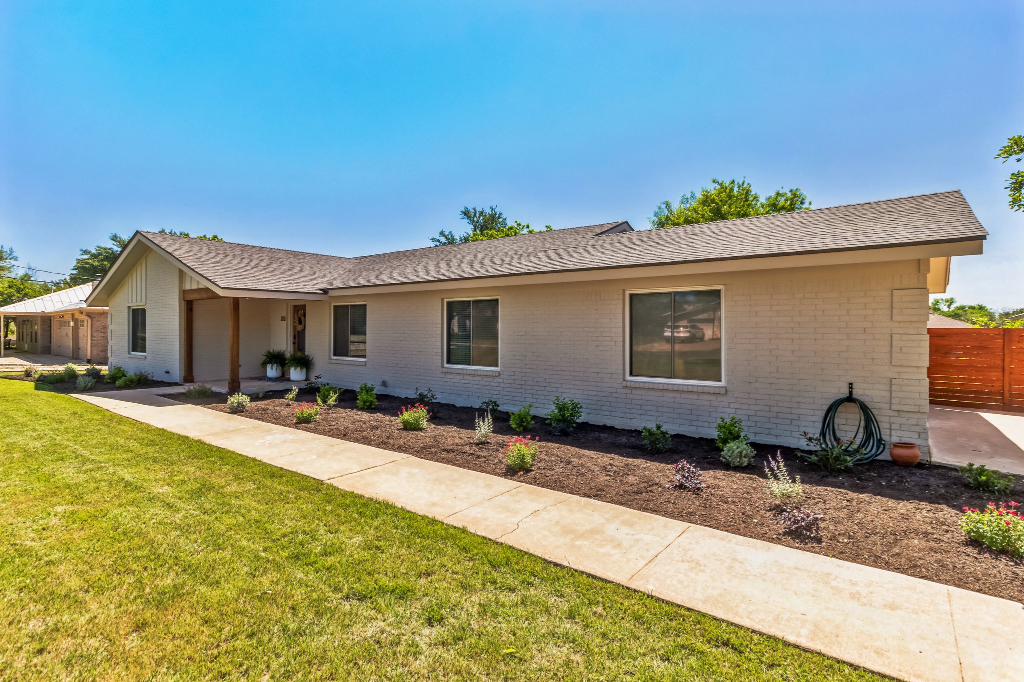 213 Clear Springs Road Georgetown, TX 78628 - Photo 2 of 33 Remodeled Ranch Style Home less than 10 minutes from the Historic Georgetown Square (mulch changed to river rock)