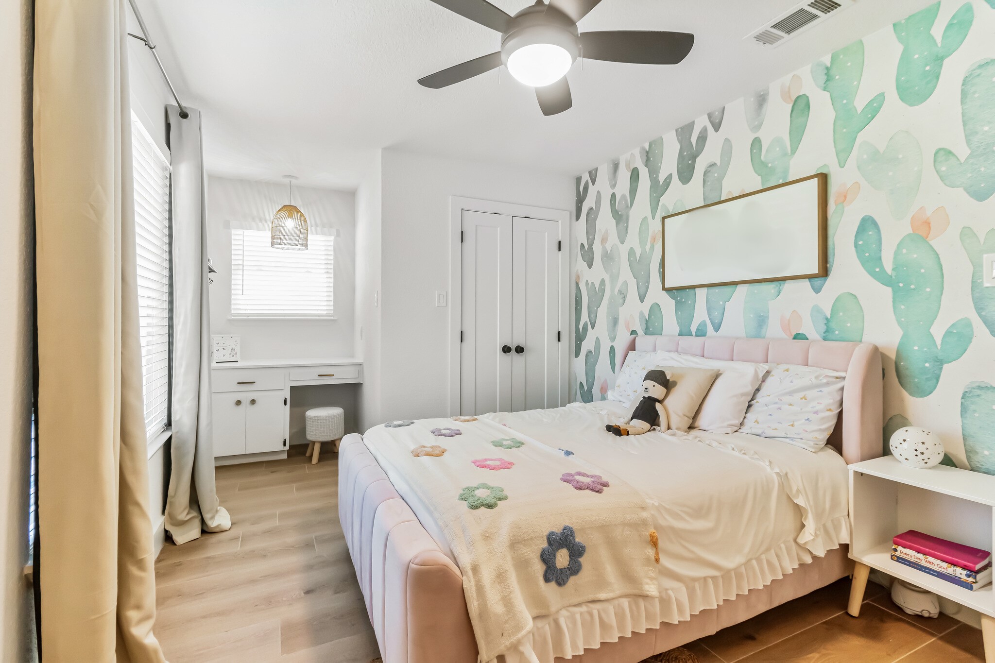 213 Clear Springs Road Georgetown, TX 78628 - Photo 22 of 33 Secondary Bedroom with Built-In Desk and Walk-In Closet with Custom Shelving