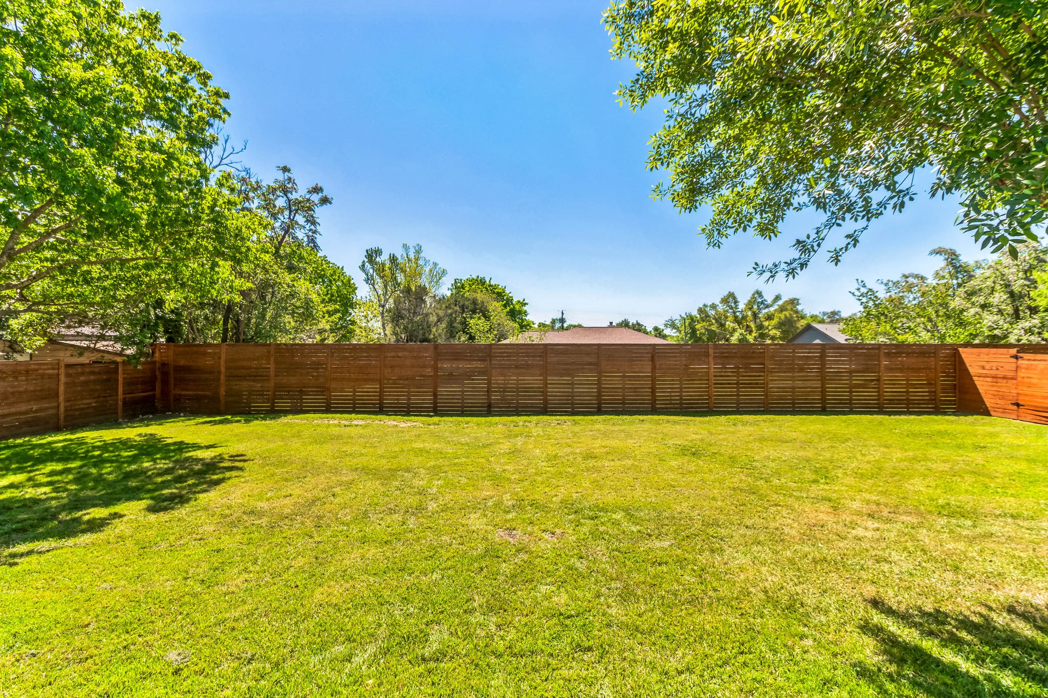 213 Clear Springs Road Georgetown, TX 78628 - Photo 29 of 33 Recent 7' (in back) 6' (sides) Horizontal Cedar Fence with Three Gates, Including a Double Gate