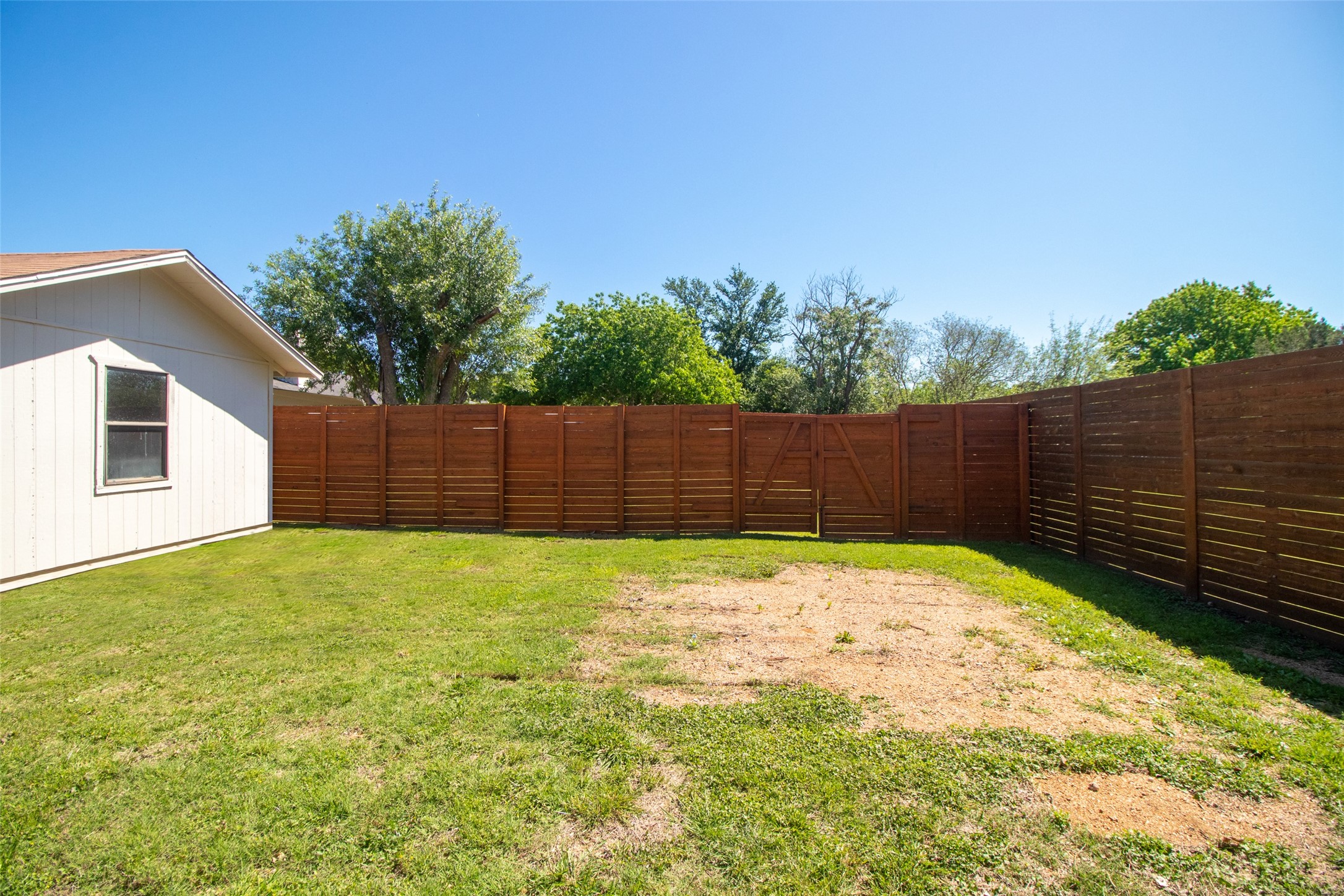 213 Clear Springs Road Georgetown, TX 78628 - Photo 33 of 33 Double Gate to Backyard to Allow for Riding Lawnmower or Equipment