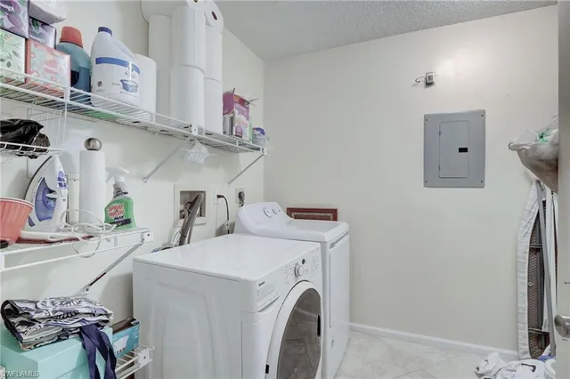 a storage room with washer and dryer