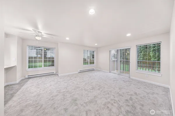 a view of balcony with wooden floor