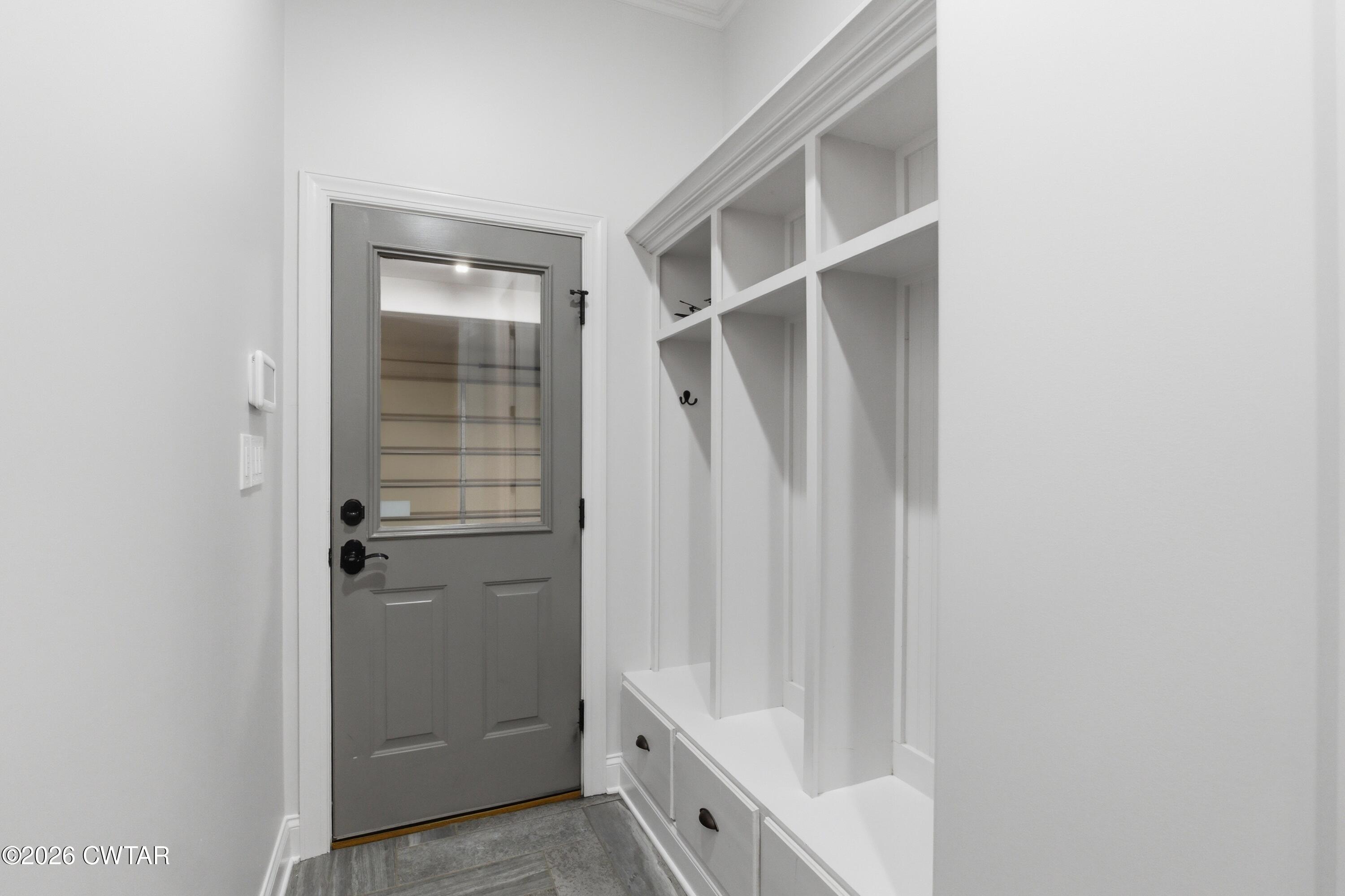 963 Ashport Road Jackson, TN 38305 - Photo 23 of 60 a bathroom with a double vanity sink and tub